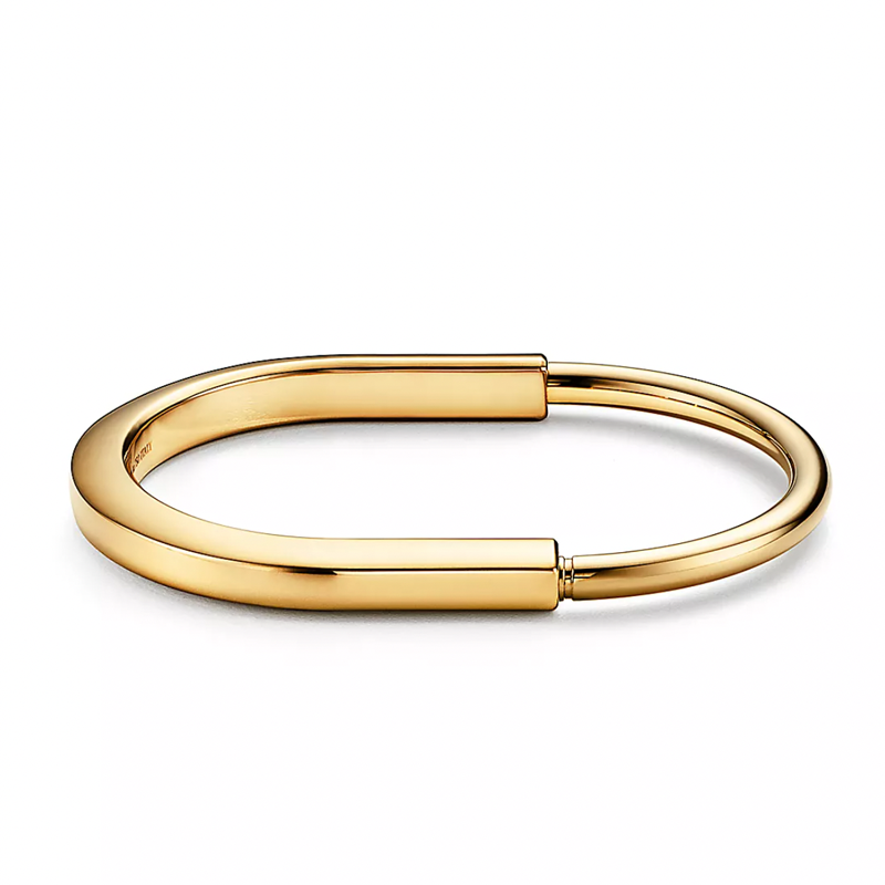Gold Cartier lock bangle
